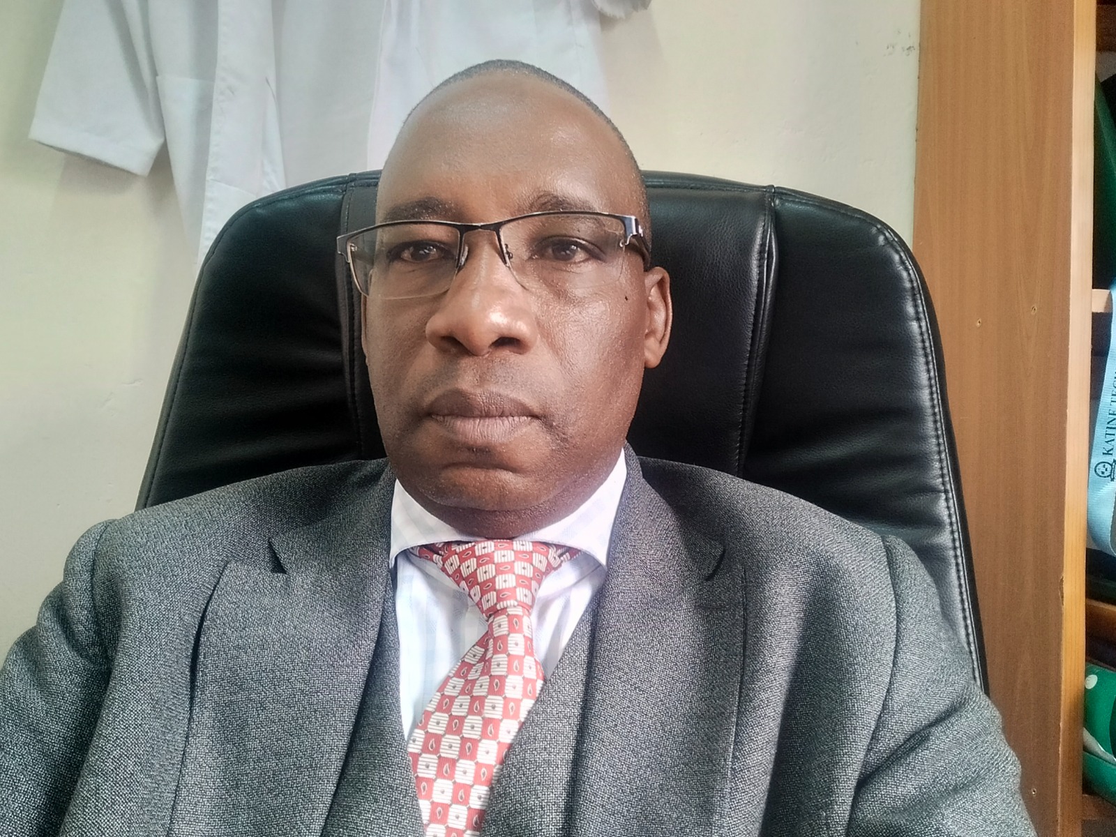 Dr Henry Omwebu